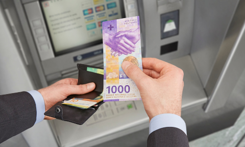 Bankomat-Szene 1000-Franken-Note 