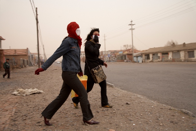 DUST STORM DAILY LIFE Xilingol steppe, Inner Mongolia Province, April 29th, 2006 Ñ Daily life during the Òdusty weather seasonÓ (January-May) in the town of Sanggen Dalai, that stands amid the Hunshandake Sandland. The rangelands in that arid expanse of the Xiligol steppe have nearly disappeared.The famous Xilingol steppe, 600 km north of Beijing, faces increasing desertification. The once-green land has been overgrazed by a booming number of livestock, becoming a major source of dust storms over northern Chinese cities, including Beijing, and reaching as far as Japan, Korea and North America.